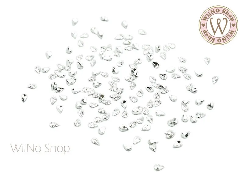2 x 3mm Silver Textured Drop Metal Studs - 25 pcs